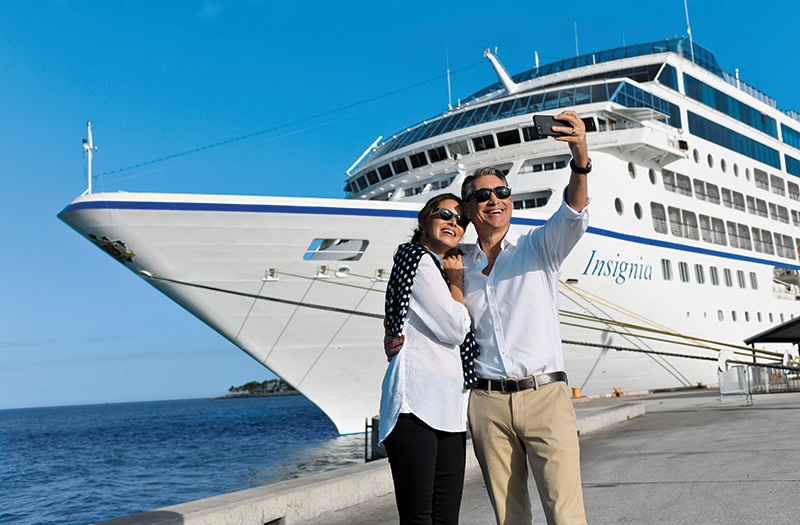 couple taking selfie off Oceania ship