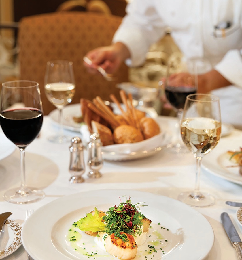 Dining on scallops on Oceania